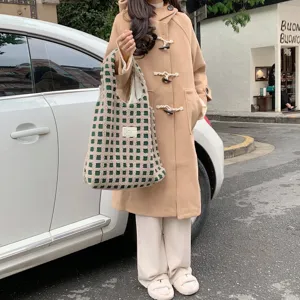Chic green and beige checkered plush tote bag, soft waffle fleece texture for daily commute.