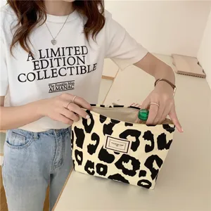 Beige leopard print canvas tote bag, stylish large capacity animal print handbag for daily use.