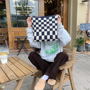 Chic knitted checkerboard tote bag for women, cozy winter fashion handbag with large capacity.
