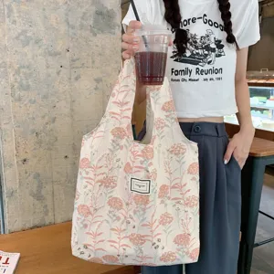 Vintage rosa florale Jacquard Achseltasche, elegante Canvas Handtasche und kleine Kosmetiktasche.