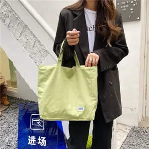 Casual canvas tote bag for women, simple light green shoulder bag for daily student use.
