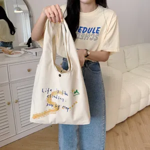Canvas shoulder bag with letter print, casual large capacity daily tote bag for women.