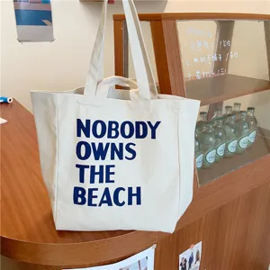 Korean literary style canvas tote bag with letter print, large capacity shoulder shopping bag.