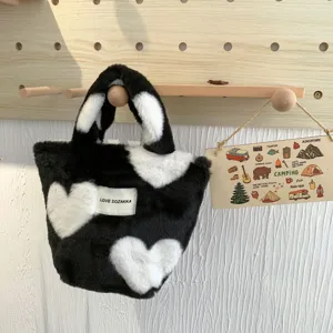 Schwarze weiße Plüsch Handtasche mit Herzmuster, flauschige Bento Tasche für den täglichen Alltag.