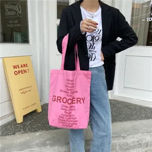 Pink canvas tote bag for women, casual single shoulder grocery letter print handbag.