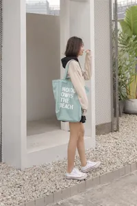 Korean minimalist canvas tote bag with letter print, large capacity student shoulder bag.