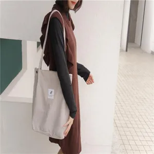 Korean style corduroy tote bag for women, large capacity shoulder bag for daily casual use.