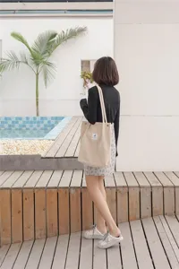 Korean style corduroy shoulder bag, large capacity casual tote bag for daily shopping use.