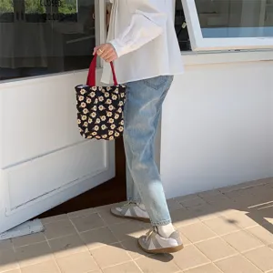 Canvas floral lunch bag with daisy print, cute red handle handbag for women and daily use.