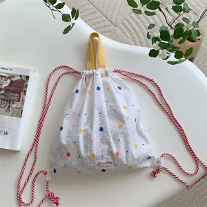 Zaino con coulisse in tela a pois colorati, simpatico zainetto casual con manico giallo.
