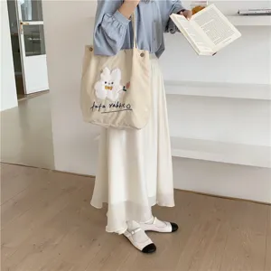 Japanese cute corduroy shoulder bag with rabbit embroidery, casual literary tote for students.