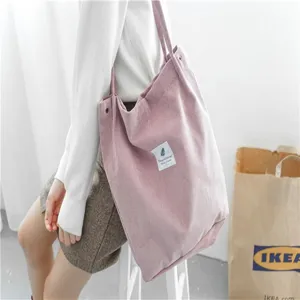 Pink corduroy tote bag for women, large capacity shoulder bag, casual aesthetic student shopping bag.