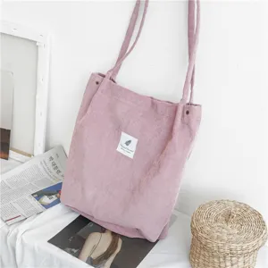 Casual corduroy tote bag for women with snap button, large capacity daily shoulder bag.