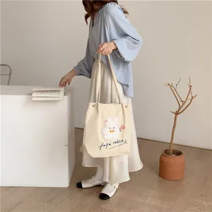 Japanese style cute corduroy shoulder bag for women, casual student canvas tote handbag.