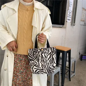 Black and white zebra print canvas handbag, stylish daily casual tote bag for women.