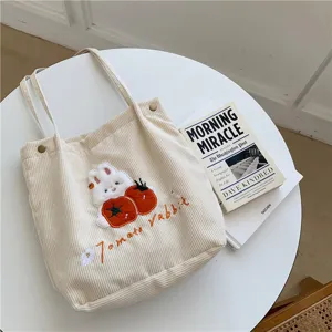 Corduroy tote bag with cute rabbit and tomato embroidery for daily use and school.