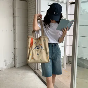 Grand sac cabas en toile avec broderie artistique et lanières contrastées, sac épaule.