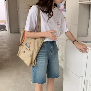 Sac cabas en toile avec broderie colorée, grand sac à épaule tendance pour femme et fille.