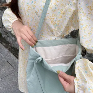 Casual washed cotton linen shoulder tote bag with multiple interior pockets for daily use.