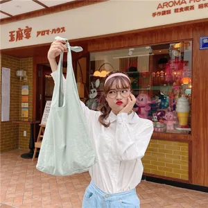 Light green canvas shoulder bag, minimalist casual knot tote bag for women daily fashion style.