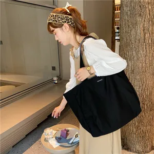 Japanese minimalist canvas tote bag for women, large capacity casual shoulder bag with plaid straps.