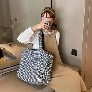 Black and white gingham canvas tote bag, casual large capacity shoulder bag detail view.