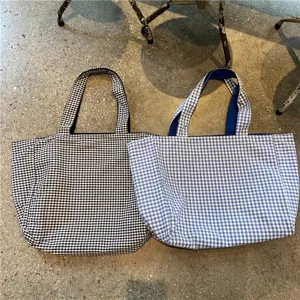 Casual gingham canvas tote bag in black and white or blue and white, large capacity daily use.