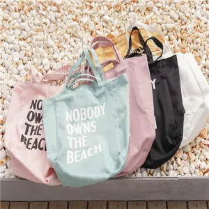 Canvas tote bag for women, casual large capacity shoulder shopping bag with letter print.