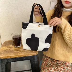 Black and white cow print corduroy tote bag, mini handbag for lunch, casual daily style.