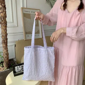 Light purple checkered tote bag casual shoulder fabric bag for daily lifestyle use.