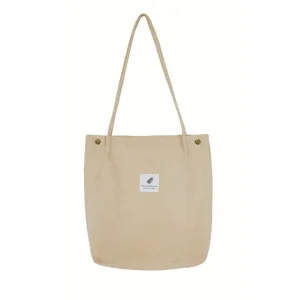 Beige corduroy shoulder bag for women, large capacity casual tote bag with snap button.