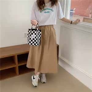 Sac à main en toile à carreaux noir et blanc, grand sac cabas minimaliste pour femmes.
