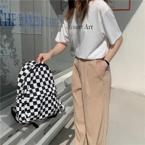 Sac à dos en toile à carreaux noir et blanc pour femmes, grand sac étudiant chic.