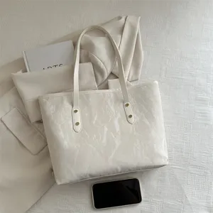White large capacity tote bag for women, stylish PU leather shoulder bag for daily commute.