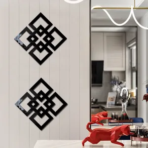 Detailed view of black geometric mirror wall stickers, Chinese style grid design for interior decor.