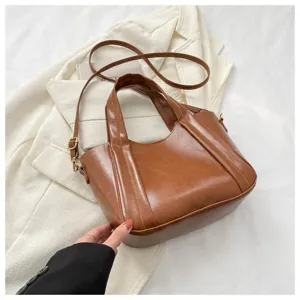 Brown PU leather shoulder bucket bag with top handles, casual stylish design for women.