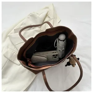 Brown leather tote bag for women, large capacity shoulder handbag, stylish commute casual bag.