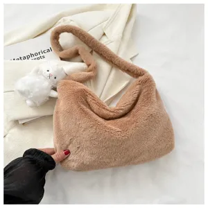 Brown fluffy shoulder bag detail, soft plush underarm bag with cute doll charm, stylish casual.