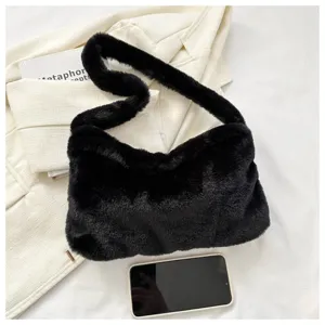 Black plush fuzzy shoulder bag for women, trendy cute fluffy underarm crossbody bag detail.