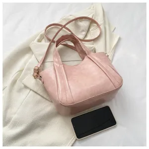 Casual pink litchi pattern PU leather tote bag with shoulder strap for women daily wear.