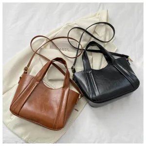 Casual soft leather bucket bag detail view, women's stylish solid color shoulder crossbody tote.