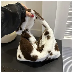 Brown and white cow print plush underarm shoulder bag fluffy faux fur crossbody bag detail view