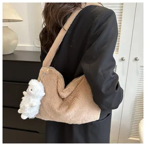 Fluffy plush shoulder bag for women, cozy winter fuzzy underarm bag with cute lamb charm.