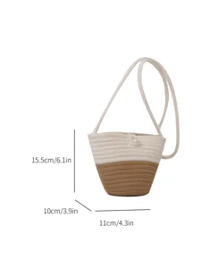 Two-tone woven bucket bag with pearl button closure, stylish casual shoulder crossbody bag.