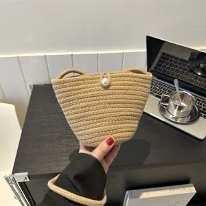 Woven straw bucket bag for women summer beach shoulder crossbody bag with elegant pearl button