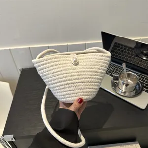 Chic woven shoulder bag for women, stylish cotton rope crossbody bucket bag with pearl