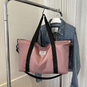 Large capacity casual pink tote bag shoulder bag for women daily travel and shopping.