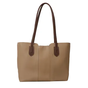 Minimalist PU leather tote bag for women, stylish brown shoulder bag for daily commute and casual use.