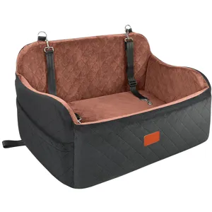 Detailed view of dog car seat featuring quilted brown interior and sturdy black fabric.