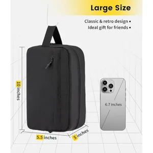 Detail view of black waterproof travel toiletry bag, portable cosmetic wash bag with handle.